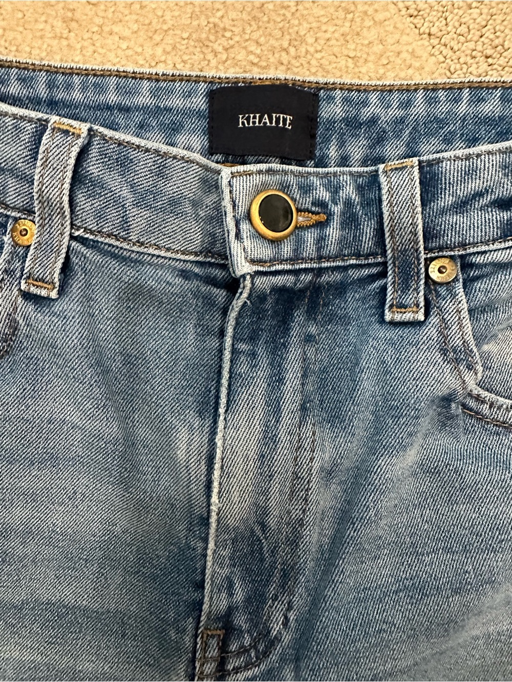 KHAITE Cropped “Vivian” Denim Jeans.